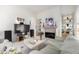 Spacious living area with a stone fireplace, entertainment center, and plush seating for relaxation at 5970 N Echo Canyon Dr, Phoenix, AZ 85018