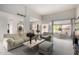 Bright living room features a high ceiling, neutral tones, and an inviting seating arrangement at 5970 N Echo Canyon Dr, Phoenix, AZ 85018