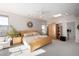 Inviting main bedroom with a ceiling fan, lots of natural light, and neutral decor at 5970 N Echo Canyon Dr, Phoenix, AZ 85018
