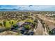 Bird's eye view of a community that boasts green spaces and beautiful trees at 6804 S 45Th Gln, Laveen, AZ 85339
