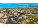 An overhead shot of a residential area with tidy lawns and nearby mountains at 6804 S 45Th Gln, Laveen, AZ 85339