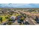 An eye-level perspective of a neighborhood featuring expansive lawns and mature trees at 6804 S 45Th Gln, Laveen, AZ 85339