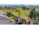 Landscaped backyard with patio, lawn, and golf course view at 6804 S 45Th Gln, Laveen, AZ 85339