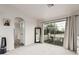 Spacious bedroom offering private balcony, ensuite access, and neutral walls and carpet at 6804 S 45Th Gln, Laveen, AZ 85339