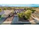 Two-story home featuring a well-manicured front yard, mature trees, and a spacious driveway at 6804 S 45Th Gln, Laveen, AZ 85339