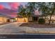 Charming single-Gathering home with a well-manicured front yard and attached two-car garage at 6804 S 45Th Gln, Laveen, AZ 85339