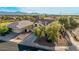 Two-story home with a well-kept lawn, mature trees, and convenient access to neighborhood streets at 6804 S 45Th Gln, Laveen, AZ 85339