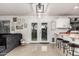 Living room and kitchen space featuring white cabinets at 6804 S 45Th Gln, Laveen, AZ 85339