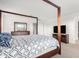 Primary bedroom showcasing a stylish bed, a dresser with mirror, and a relaxing ambiance at 6823 W Getty Dr, Phoenix, AZ 85043