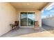Cozy covered patio with outdoor seating perfect for relaxing and enjoying the outdoors at 6823 W Getty Dr, Phoenix, AZ 85043
