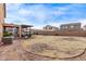 Expansive backyard with desert landscaping, providing a low-maintenance outdoor space at 6925 W Maldonado Rd, Laveen, AZ 85339