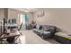 Bedroom featuring ample space with neutral walls and tile floors at 6925 W Maldonado Rd, Laveen, AZ 85339