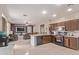 Open concept floor plan showcasing the kitchen and living room at 6925 W Maldonado Rd, Laveen, AZ 85339
