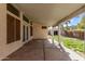 Covered patio with a concrete floor, offering an ideal space for outdoor living and entertaining at 6925 W Maldonado Rd, Laveen, AZ 85339