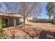 This backyard features a spacious outdoor area and covered patio, perfect for outdoor living at 7359 W Rancho Dr, Glendale, AZ 85303