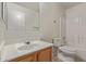 A bathroom with a tub, toilet, and sink at 7359 W Rancho Dr, Glendale, AZ 85303