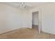 A bedroom featuring a ceiling fan and carpeted floors at 7359 W Rancho Dr, Glendale, AZ 85303