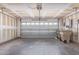 Spacious two-car garage with ample storage and natural light at 7359 W Rancho Dr, Glendale, AZ 85303