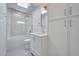Elegant bathroom features a tub/shower combo with tile surround, vanity, modern fixtures, and ample storage space at 7939 E Via Linda --, Scottsdale, AZ 85258
