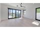 Spacious bedroom with large sliding glass doors providing ample natural light and backyard views at 7939 E Via Linda --, Scottsdale, AZ 85258
