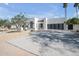 Modern home featuring clean lines, textured facade, and sleek black garage door at 7939 E Via Linda --, Scottsdale, AZ 85258
