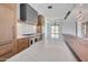 Modern kitchen features a marble island, custom cabinets and stainless steel appliances at 7939 E Via Linda --, Scottsdale, AZ 85258