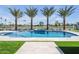 Stunning pool with pristine blue water, adjacent spa, manicured landscaping, and golf course views at 7939 E Via Linda --, Scottsdale, AZ 85258
