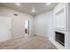 Spacious carpeted bedroom with a fireplace, neutral walls, and ensuite bath at 902 W Glendale Ave # 115, Phoenix, AZ 85021