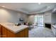 Inviting living room with a fireplace, sliding door and a convenient wet bar for entertaining at 902 W Glendale Ave # 115, Phoenix, AZ 85021