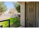 Covered patio with a security door that leads to the low maintenance backyard at 902 W Glendale Ave # 115, Phoenix, AZ 85021
