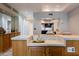 Well-equipped wet bar area, perfect for hosting guests, with a seamless connection to the kitchen at 902 W Glendale Ave # 115, Phoenix, AZ 85021