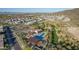 Stunning aerial view of community, showcasing pool, recreation areas, and lush desert landscaping at 1127 E Mcneil St, Phoenix, AZ 85042