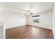 Spacious bedroom with a ceiling fan, window view, and wood-look floors at 1227 W Avalon Canyon Dr, Casa Grande, AZ 85122