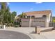 Stunning two-story home with a three-car garage, tile roof, and well-maintained landscaping at 1327 E Le Marche Ave, Phoenix, AZ 85022