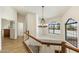 Hallway with lots of natural light, wooden floors, and white walls at 1327 E Le Marche Ave, Phoenix, AZ 85022