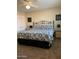 Comfortable bedroom featuring a stylish bed, coordinating nightstands, and ample closet space at 136 N 63Rd St, Mesa, AZ 85205