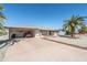 Charming single-story home with desert landscaping and a convenient covered carport at 136 N 63Rd St, Mesa, AZ 85205