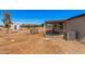 Exterior backyard view showing a fire pit and an air conditioning unit at 13802 N 186Th Ave, Surprise, AZ 85388