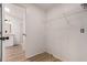 Walk-in closet with a hanging rack for easy storage at 13802 N 186Th Ave, Surprise, AZ 85388