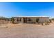Charming home with a covered entrance and desert landscaping, offering curb appeal and a welcoming exterior at 13802 N 186Th Ave, Surprise, AZ 85388