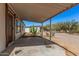 Covered patio area with a desert landscape and plenty of space at 13802 N 186Th Ave, Surprise, AZ 85388