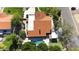 An aerial view of this home and pool with a putting green in the backyard at 1530 E Jeanine Dr, Tempe, AZ 85284