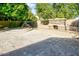 Inviting backyard with stone outdoor fireplace and water feature, perfect for entertaining at 1530 E Jeanine Dr, Tempe, AZ 85284