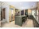 Expansive kitchen featuring a center island, granite countertops, and classic cabinetry with recessed lighting at 1530 E Jeanine Dr, Tempe, AZ 85284