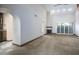 Spacious living room with a fireplace, carpet floor and sliding glass doors at 1530 E Jeanine Dr, Tempe, AZ 85284