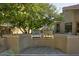 Outdoor kitchen features a stainless-steel grill, counter space, and an orange tree at 1530 E Jeanine Dr, Tempe, AZ 85284