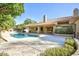 Inviting backyard pool surrounded by stone patio, perfect for relaxing and entertaining at 1530 E Jeanine Dr, Tempe, AZ 85284