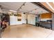 Spacious garage with ample storage, cabinets, and organized workspace area; ideal for projects at 16013 N 111Th Pl, Scottsdale, AZ 85255