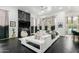 Spacious living room features a black marble fireplace and comfortable seating at 16013 N 111Th Pl, Scottsdale, AZ 85255