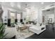 Open-concept living area offers great natural light and sleek design features at 16013 N 111Th Pl, Scottsdale, AZ 85255